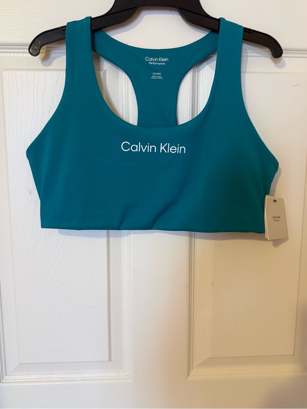 Calvin Klein performance Teal racerback sports bra with white logo
